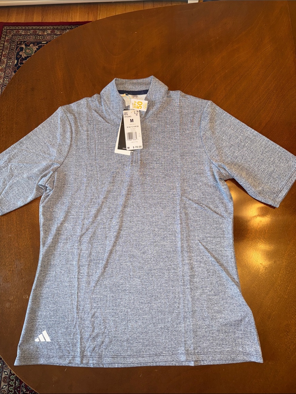 adidas Women’s Heathered Blue Short Sleeve Polo UPF50